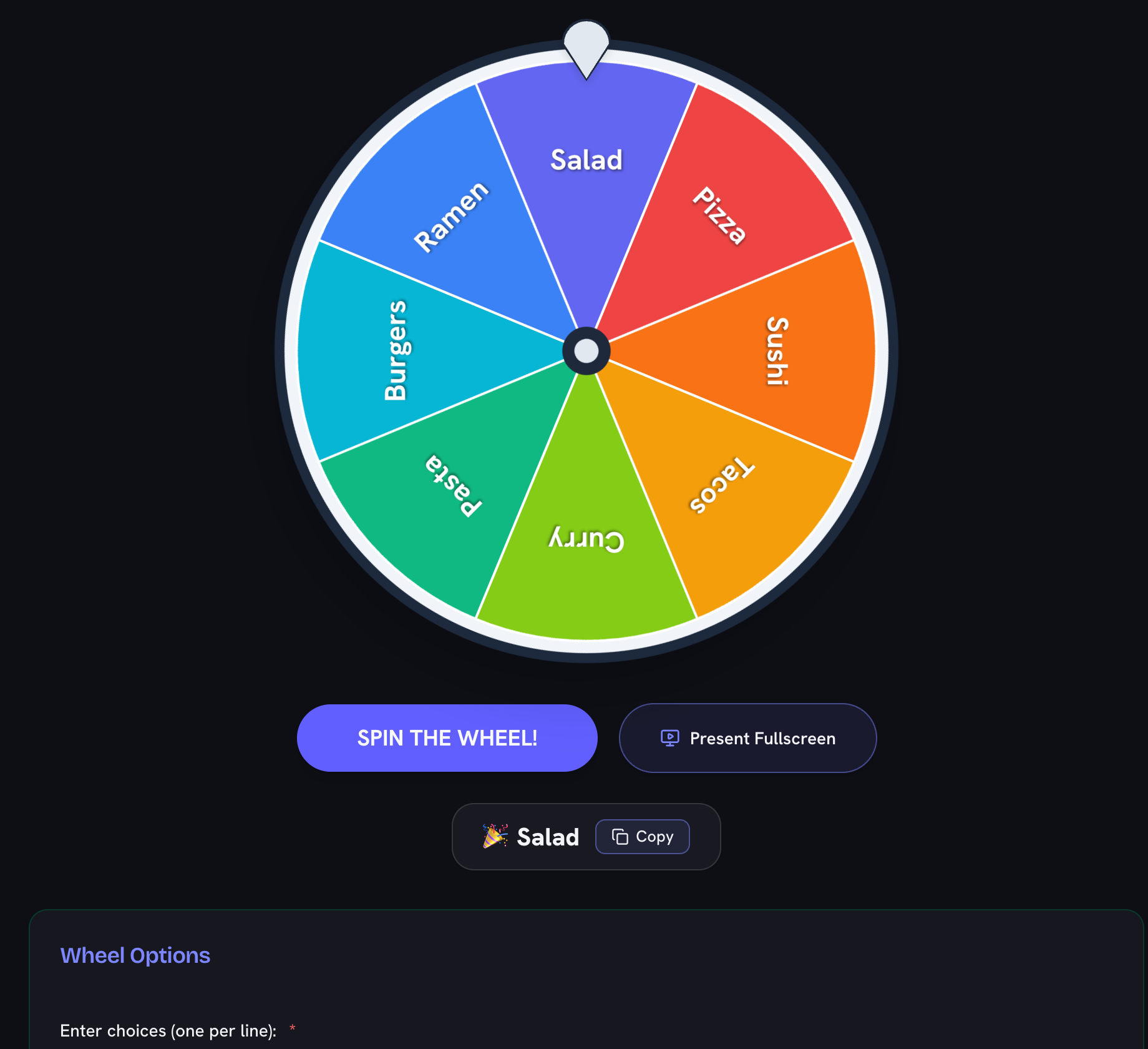 The colour wheel come to rest after a spin, confetti falling, with the winning choice Salad shown below the Spin the Wheel button